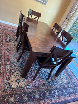 Solid wood dining room table + 8 chairs
