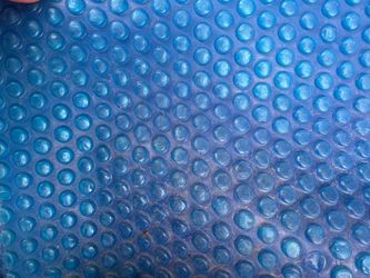 Solar pool cover