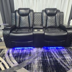 Brand New Faux Leather Power Reclining Love Seat