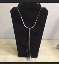 Silver tassel in flat silver chain