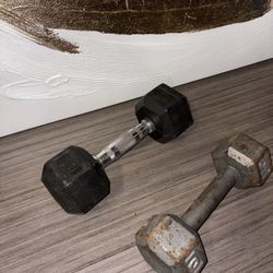 Set of two 10-pound dumbbells, perfect for strength training, home workouts, or fitness routines. Solid construction with comfortable grip and durable