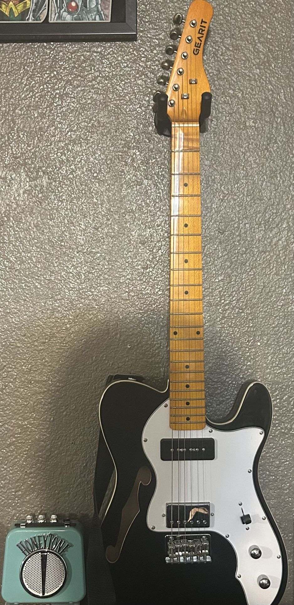 Electric Guitar With Amplifier And Guitar Hook