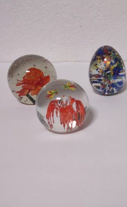 Three paperweights, different styles and sizes, all three for one price.