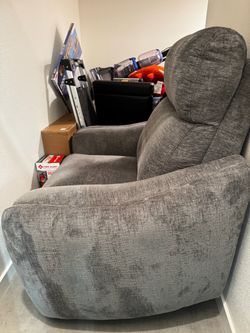 Swivel, rocker recliner chair