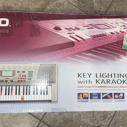CASIO KEY LIGHTING KEYBOARD WITH KARAOKE LK-94TV