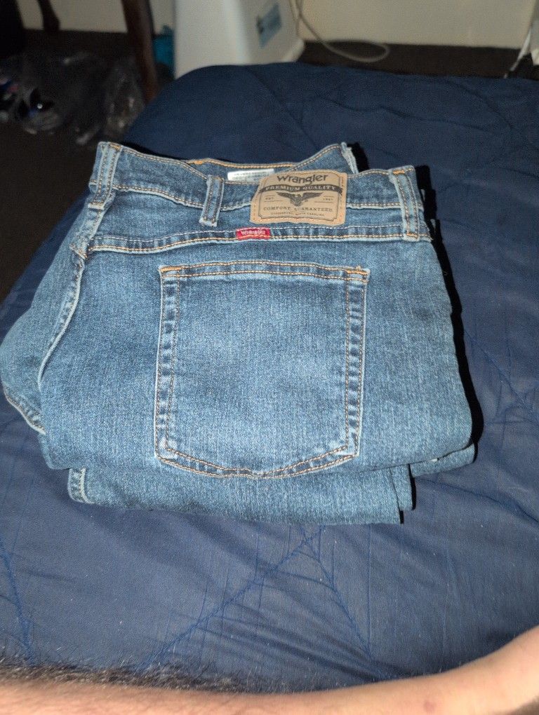 2 Pairs Of Wrangler Jeans 38x32 For The Size 