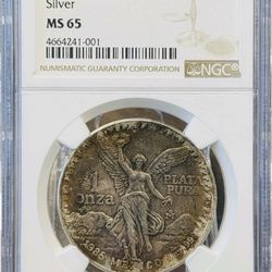 1985 libertad ngc ms65 crazy color