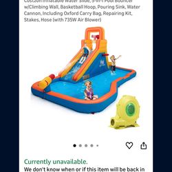 Inflatable water slide with compressor