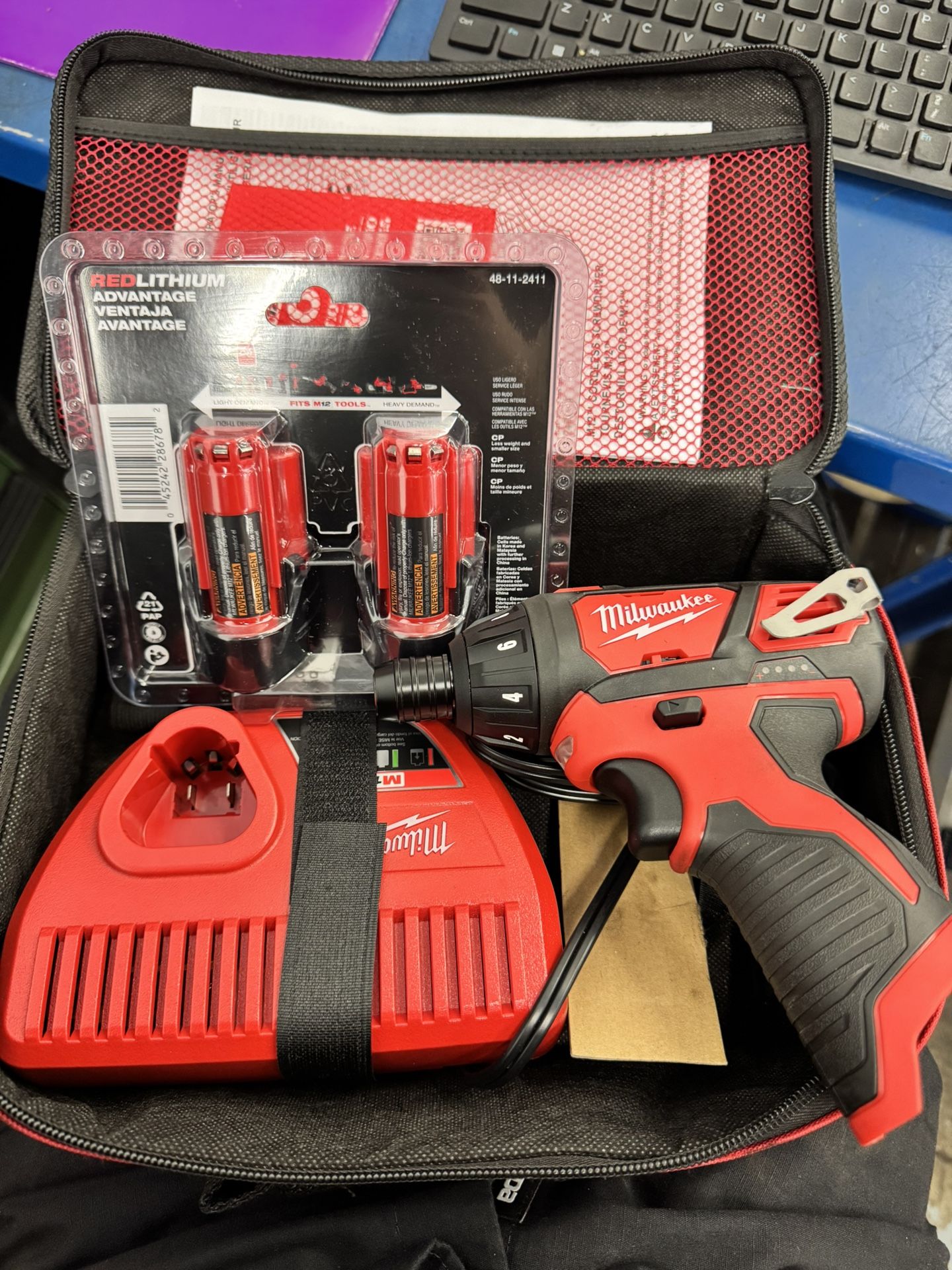 Milwaukee Gun With 2 Batteries And Charger