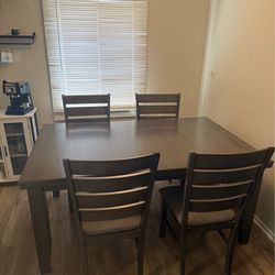Dining room table with chairs