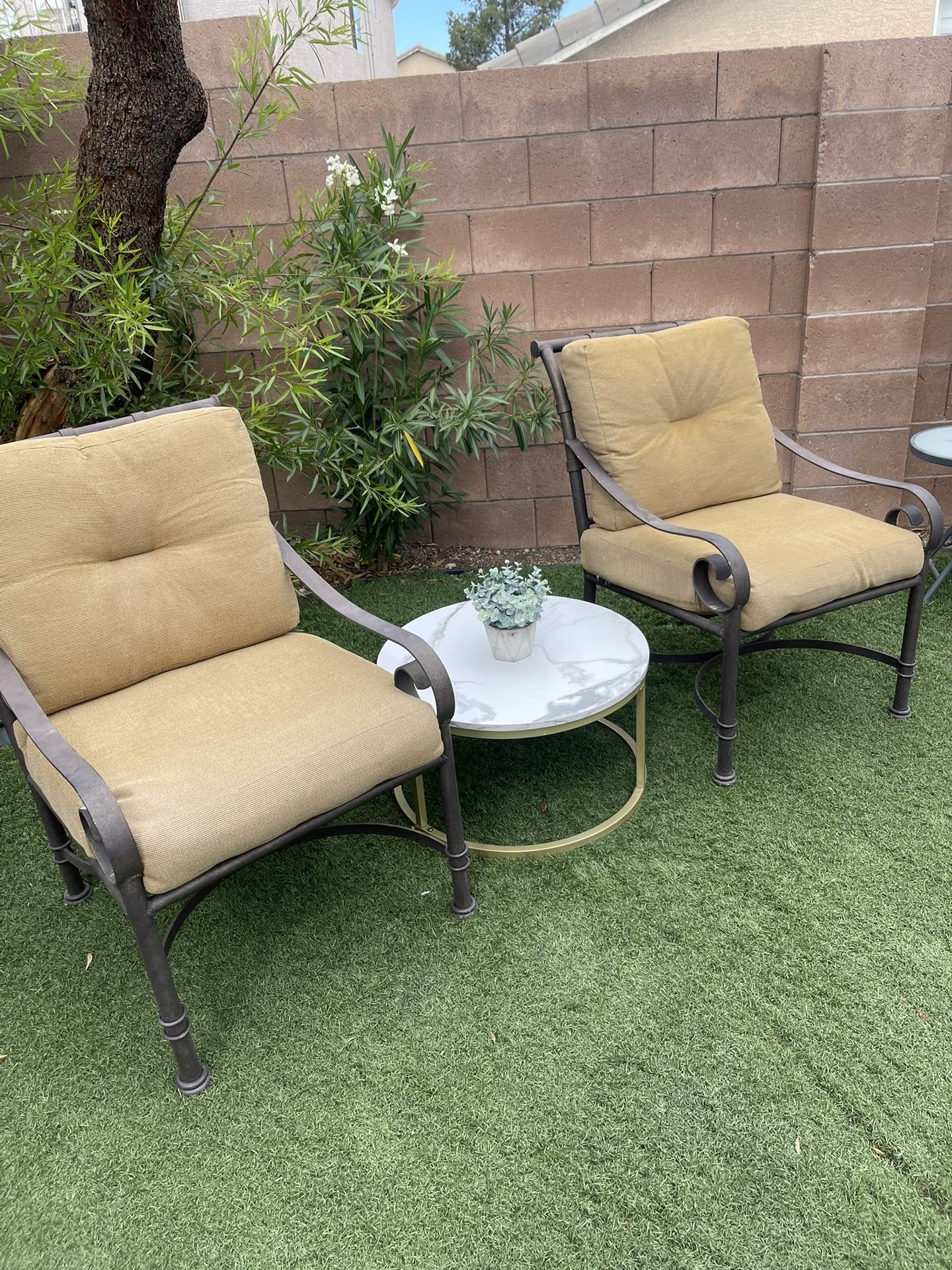 Two Chairs Outside Door End Coffee Table