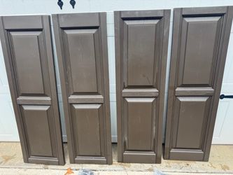 (2) Sets New Brown Vinyl Shutters 15” x 46 1/2”. $15 A Set. Must Pickup