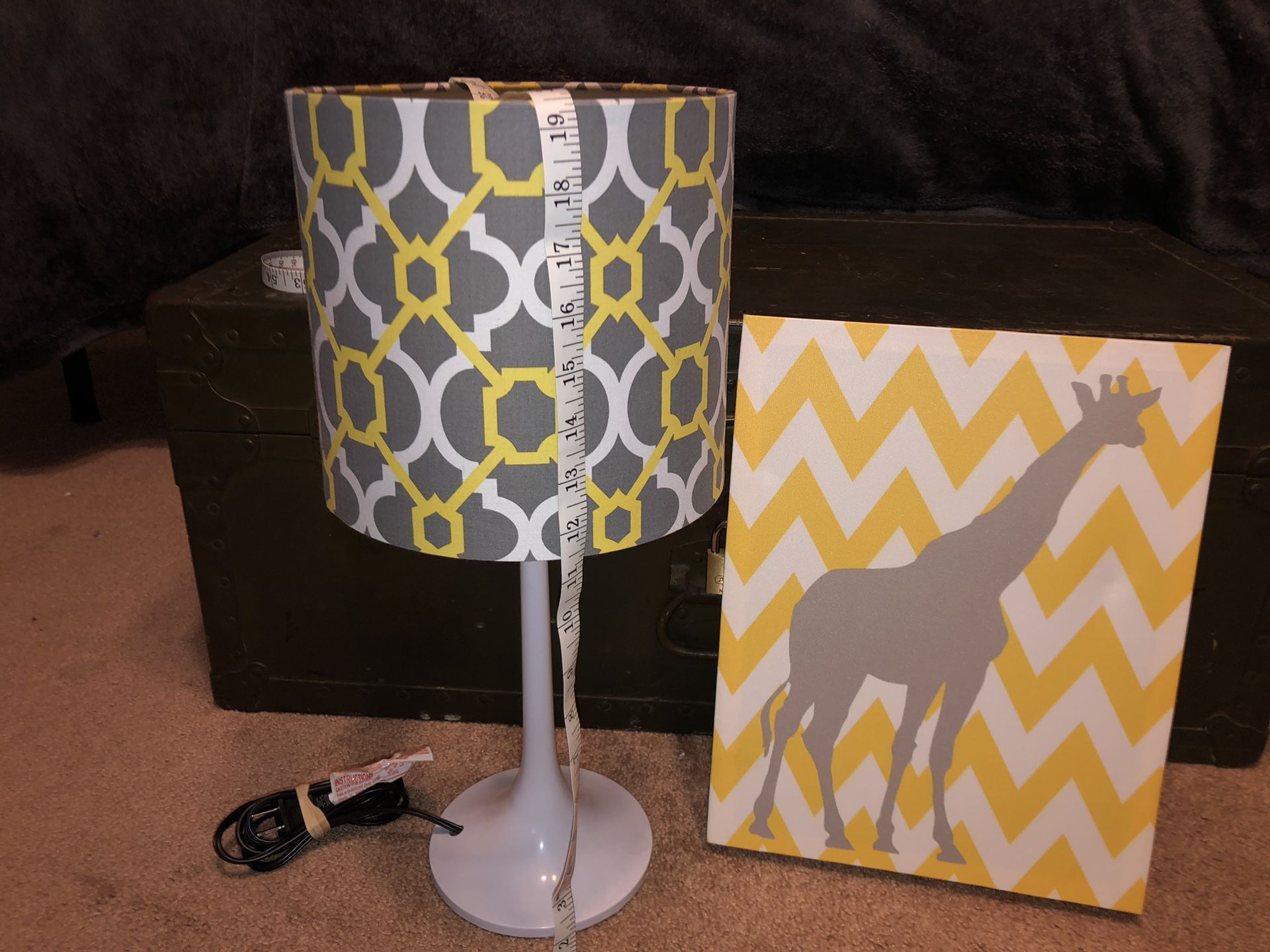 Lamp and giraffe picture