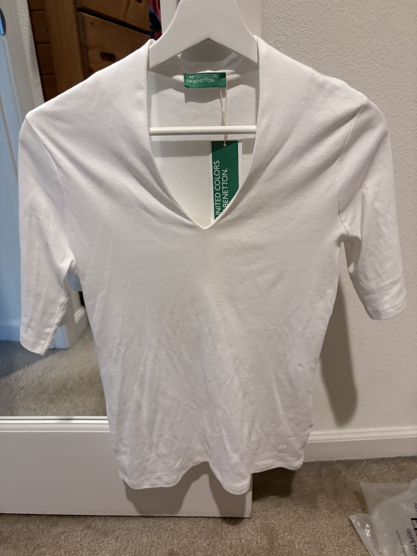 Benetton white shirt with half sleeves. New