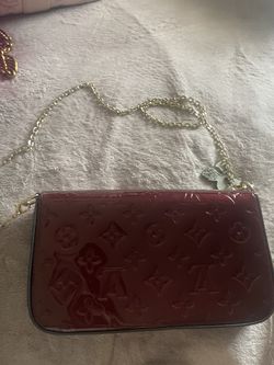 red and brown lv bag