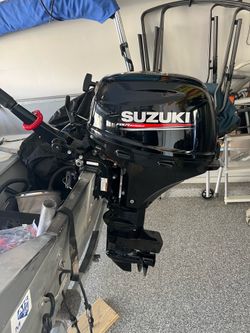 15 hp Susuki outboard 15 inch regular shaft