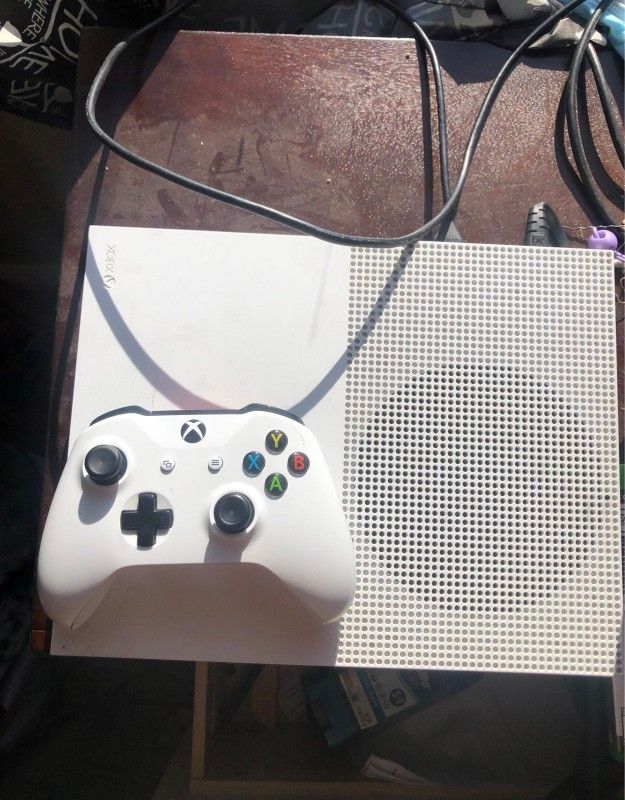 xbox one s am giving it out to bless someone who first wish me happy wedding anniversary on my cellphone number now  707^340^9916