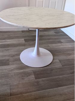 Round marble-look table