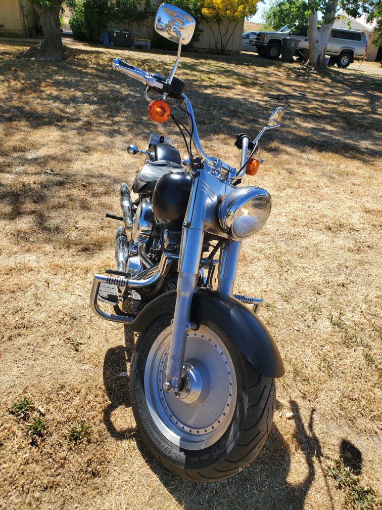 Photo 98 Harley Fatboy. $3500.
