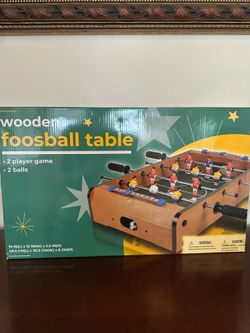 Wooden foosball table, unopened box, 2 players, 2 balls, $28, no holds