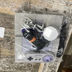 Super Nintendo console with controller $165