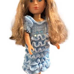 Doll 15” blue eye beauty in a knitted dress blue the same color as her eyes. Previously owned no original box.  T-412