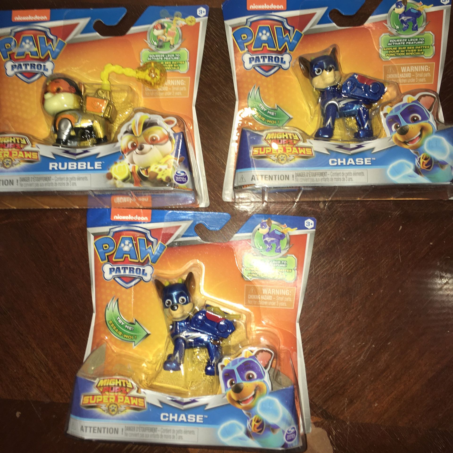 PAW Patrol, Mighty Pups Super PAWs Chase Figure with Transforming Backpack, for Kids Aged 3 and UpFour dollars each