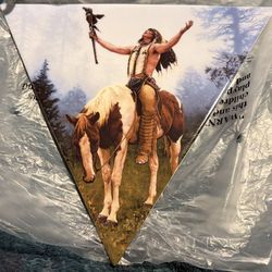 triangular collector's plate titled "Deliverance" by artist Chuck Ren