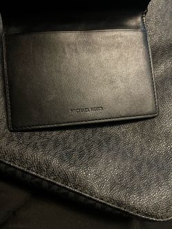 Black Michael Kors with purse