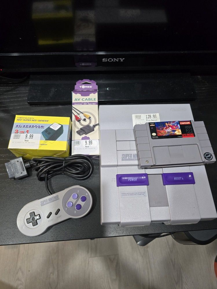 Super Nintendo with Alladin Game.
