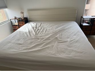 King size bed frame with mattress and mattress cover