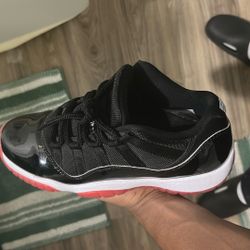 Jordan 11 Retro Low Bred