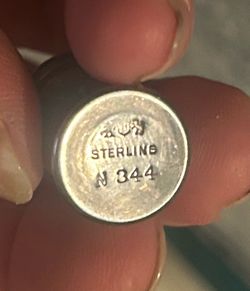 Sterling Silver STAMPED AND NUMBERED SALT AND PEPPER SHAKERS. These are approx 1 in tall and a little smaller diameter then the dime shown in photos!
