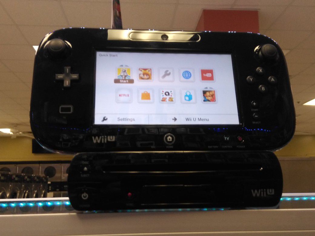 Nintendo Wii U complete and a game see pict.