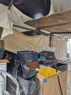 Carport , have all the polls need a new tarp