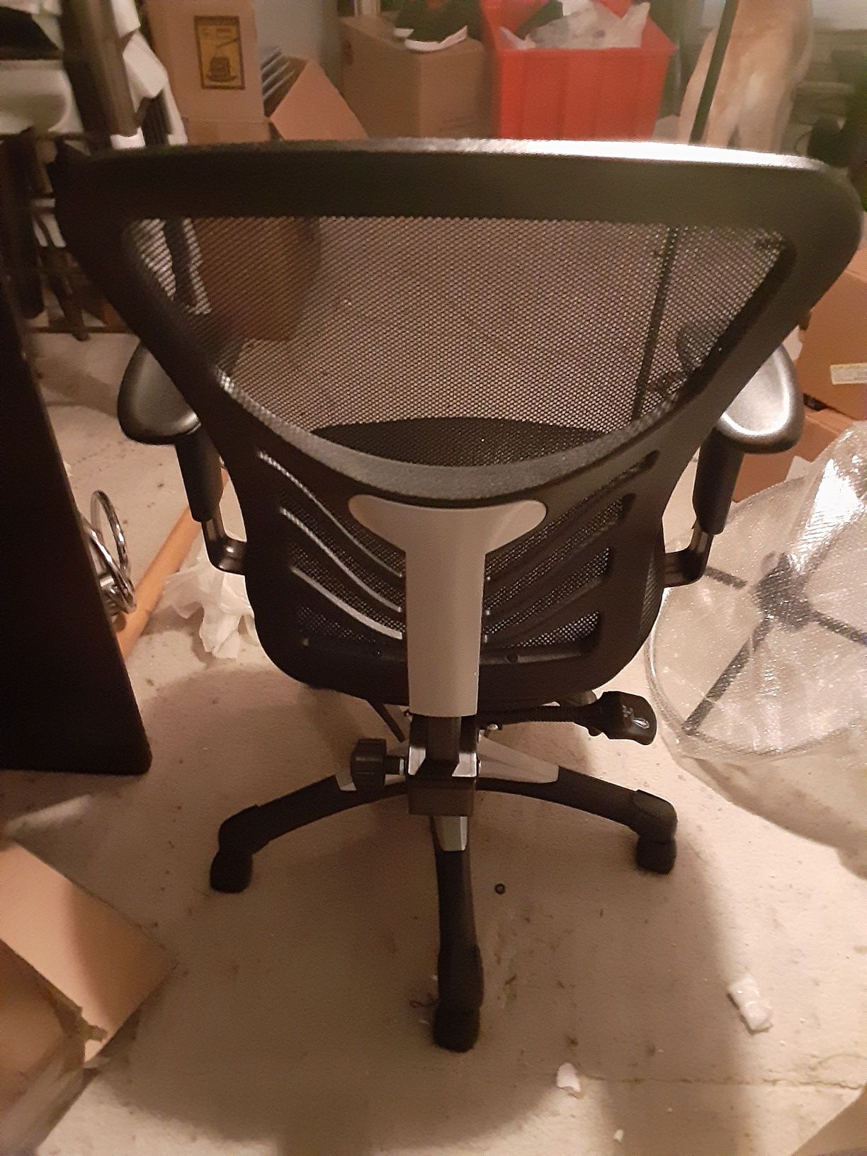 New black mesh back office chair with reclining