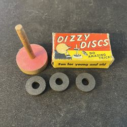 1950s  Dizzy Discs magic tricks. Pranks and gags In original packaging.