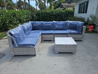 New and assembled seven piece modular outdoor patio set