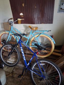 2 huffy bikes in good working condition. one male mountain bike and a female beach cruiser.