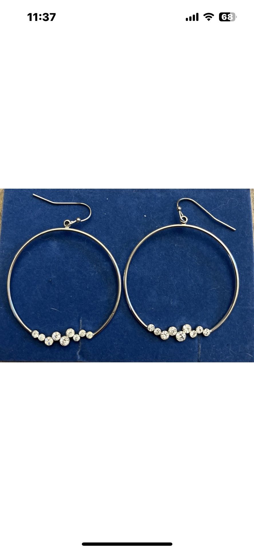 Silver Toned dangle earrings with rhinestones.