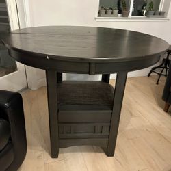 High dining circle table with drawer storage  