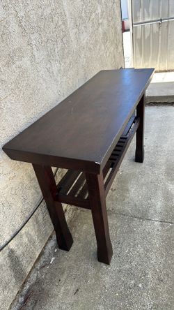 Tv stand solid wood great condition must go by today pick up only