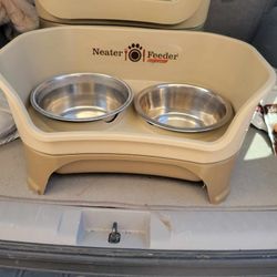 Sells new for 70 bucks plus..

Neater Feeder Deluxe | small Dog | Cappuccino Elevated Dog Bowl Dish Mess Drip container. 

