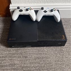 Xbox One And Two Controllers 
