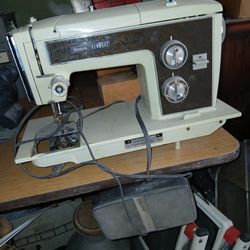 SEARS KENMORE VTG. WITH ALOT OF SEWING ASSESORIES NEEDLES PATCHES ECT 