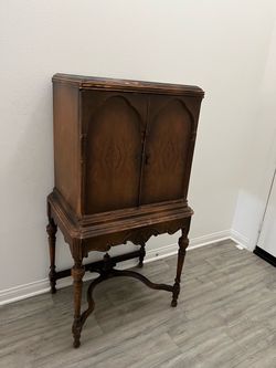 Old radio.  Empty cabinet