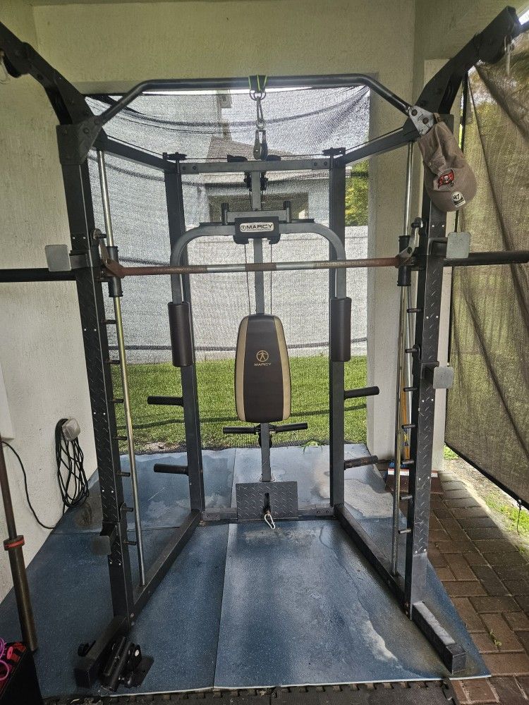 Smith machine accessories and landmine