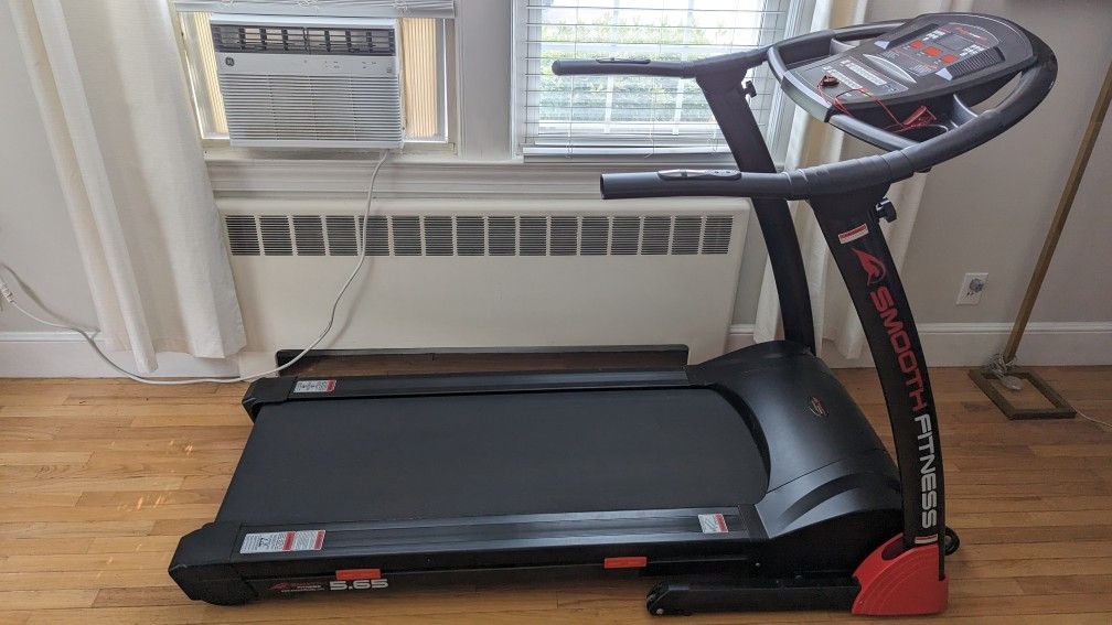 Smooth Fitness - 5.65 Folding Treadmill
( See Description)