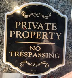 METAL NO TRESPASSING SIGN