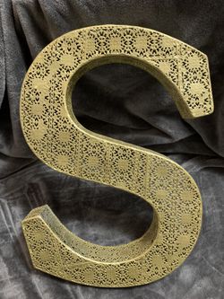 Gold letter S decoration